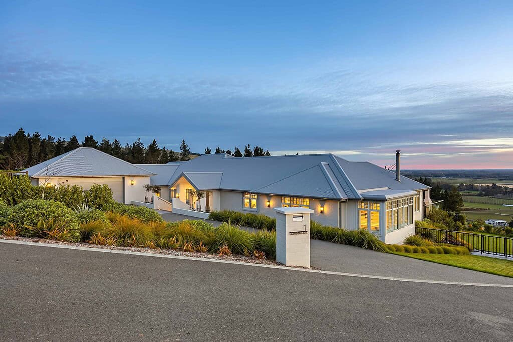 Coughlan Homes build on an elevated Canterbury site looking out over the plains at dusk.